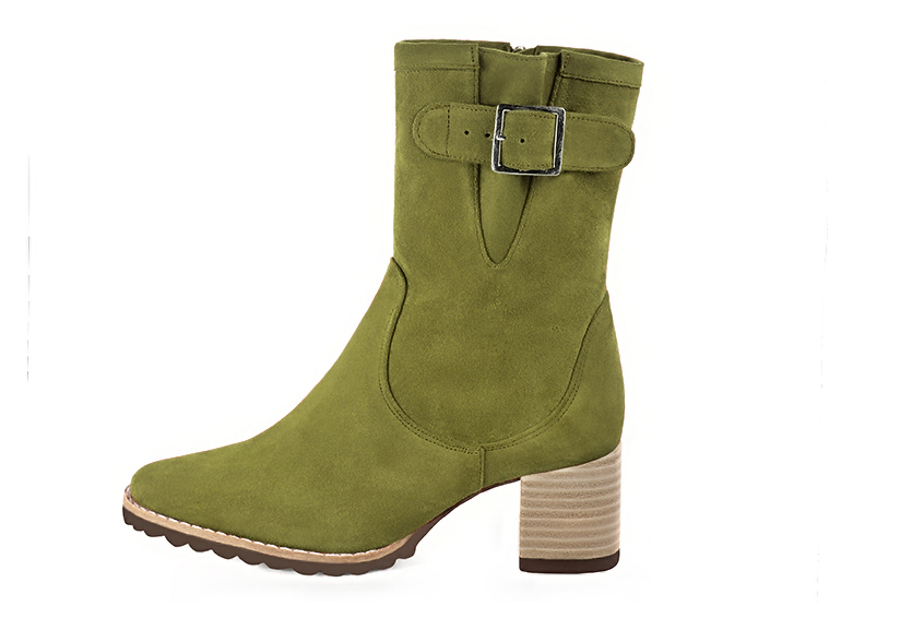 Pistachio green women's ankle boots with buckles on the sides. Round toe. Medium block heels. Profile view - Florence KOOIJMAN